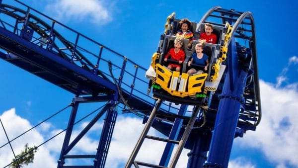 Kids riding one of the roller coaster rides at Legoland Florida.