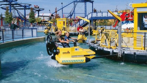 A family enjoying the wave racer ride.