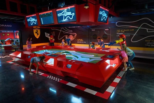 Kids of all ages having fun with the ferrari build experience.