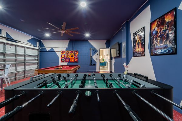 Games room showing foosball and ping ping