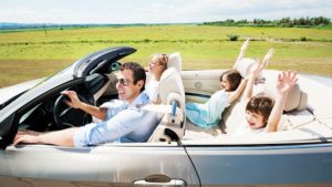 Image of family driving in car