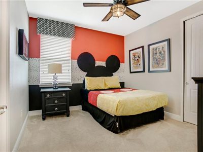 Disney themed bedroom with full bed