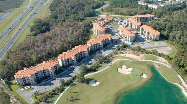 Image of aerial view of Tuscana Resort showing golf course