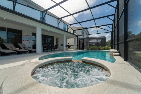 Running hot tub in pool area
