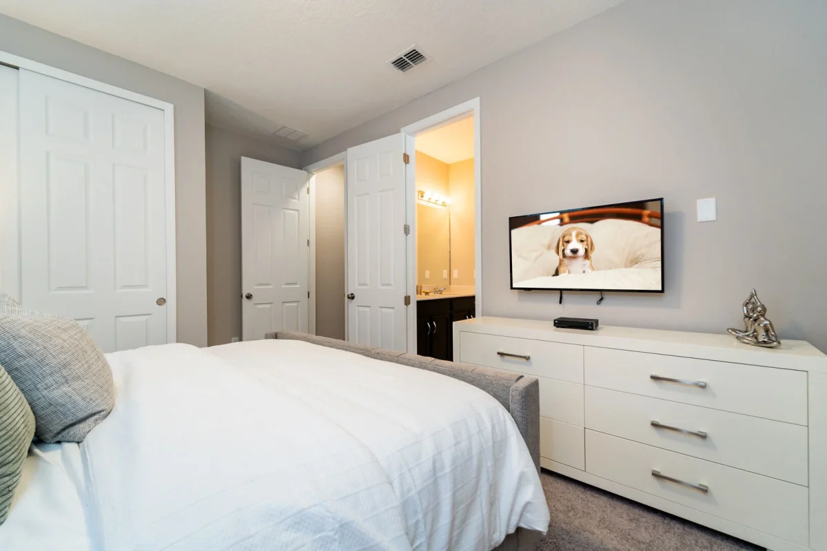 Bedroom with smart tv in one of our Orlando rentals near Disney