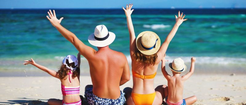 Floridian family enjoying themselves on beach 