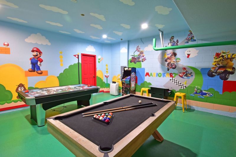 Themed games room inside a vacation rental near Disney managed by Orlando rent a villa 