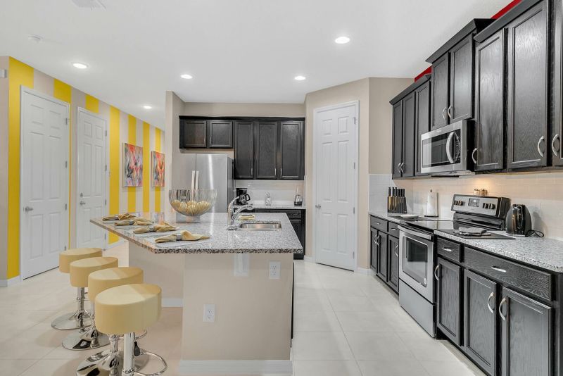 Fully equipped kitchen inside a vacation rental near Disney