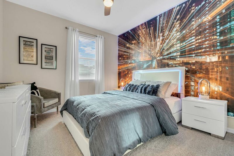 City themed queen bedroom inside a rental near Disney 