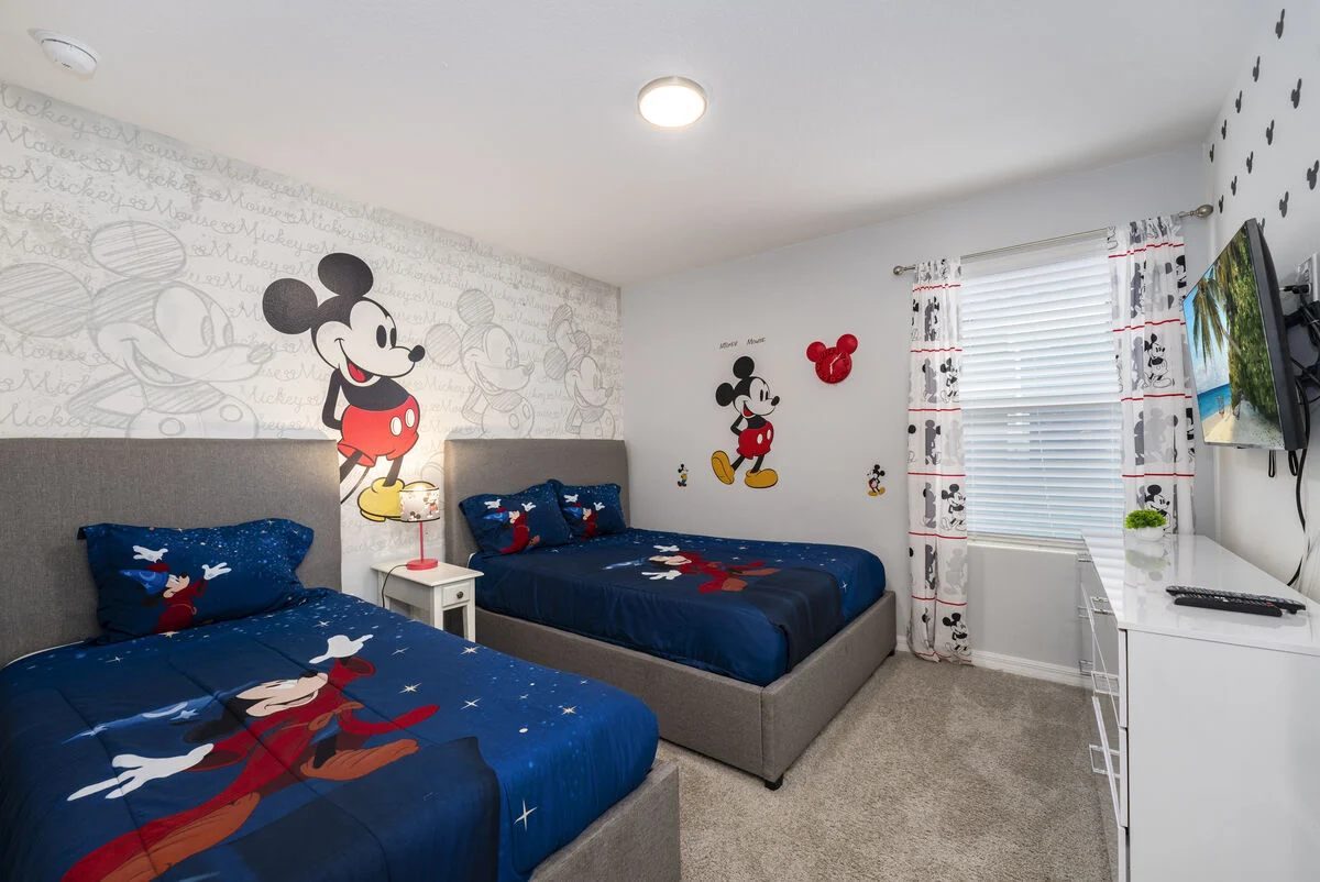 Mickey-themed twin bedroom at S1949TPC - Tropical Delight vacation home. 