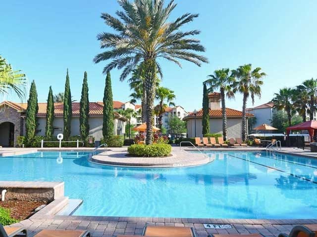 Tuscana Resort Community pool showing clubhouse.